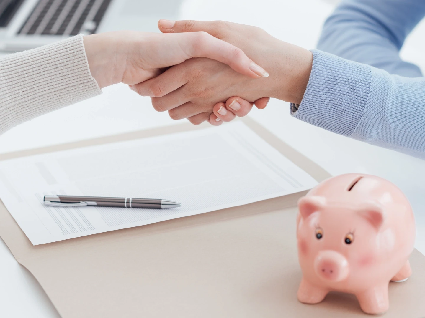 Image of a pink piggy bank, symbolising personal injury compensation, legal fees, and financial claims after a road accident. The image is being used to advertise Gildeas Solicitors, a personal injury firm based in Scotland.