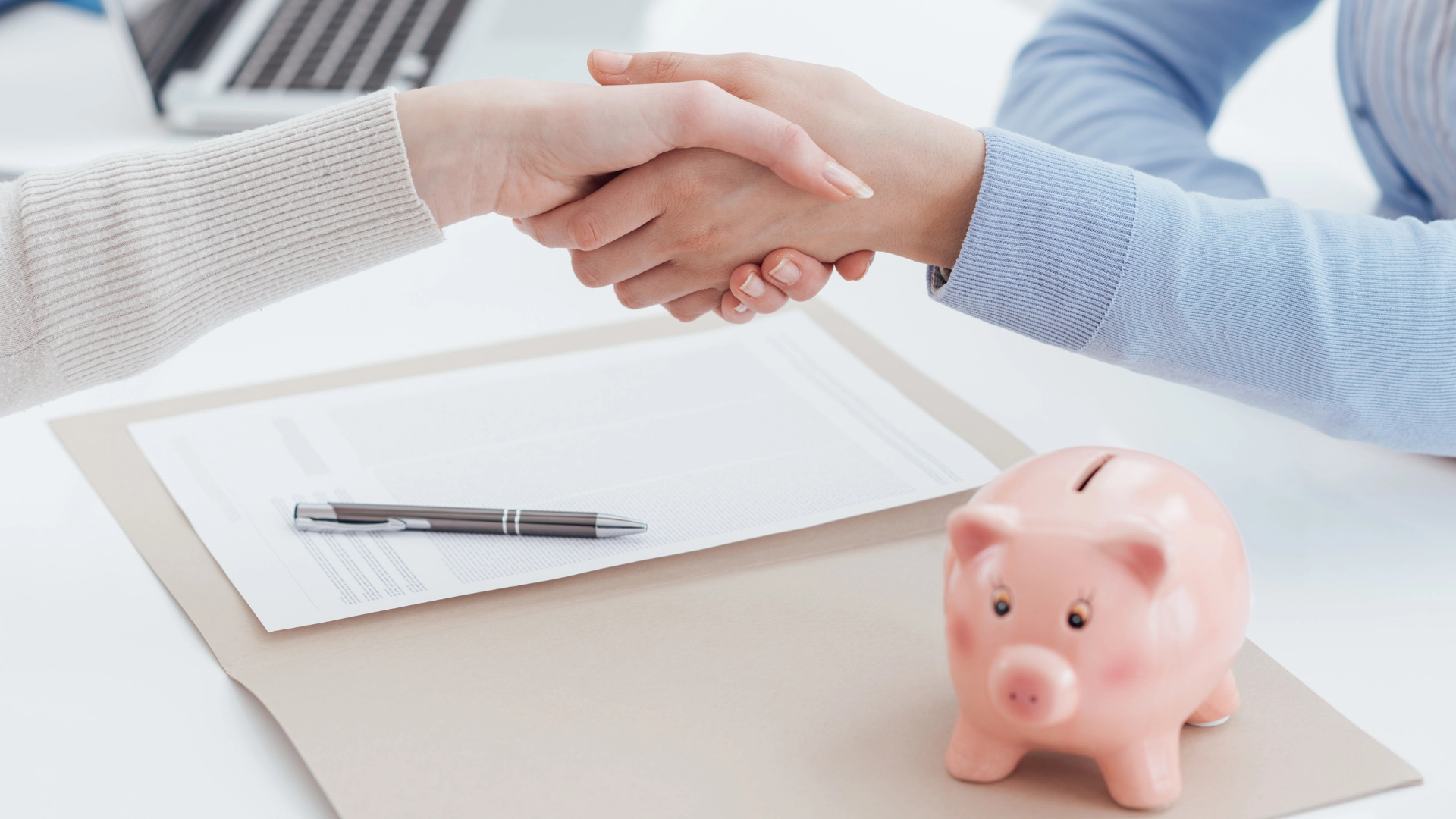 Image of a pink piggy bank, symbolising personal injury compensation, legal fees, and financial claims after a road accident. The image is being used to advertise Gildeas Solicitors, a personal injury firm based in Scotland.