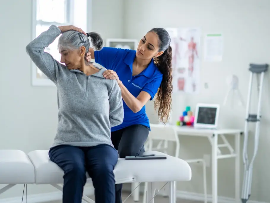 Physiotherapy rehabilitation session helping an older woman recover mobility after a personal injury, relevant to personal injury claims with Gildeas Solicitors.